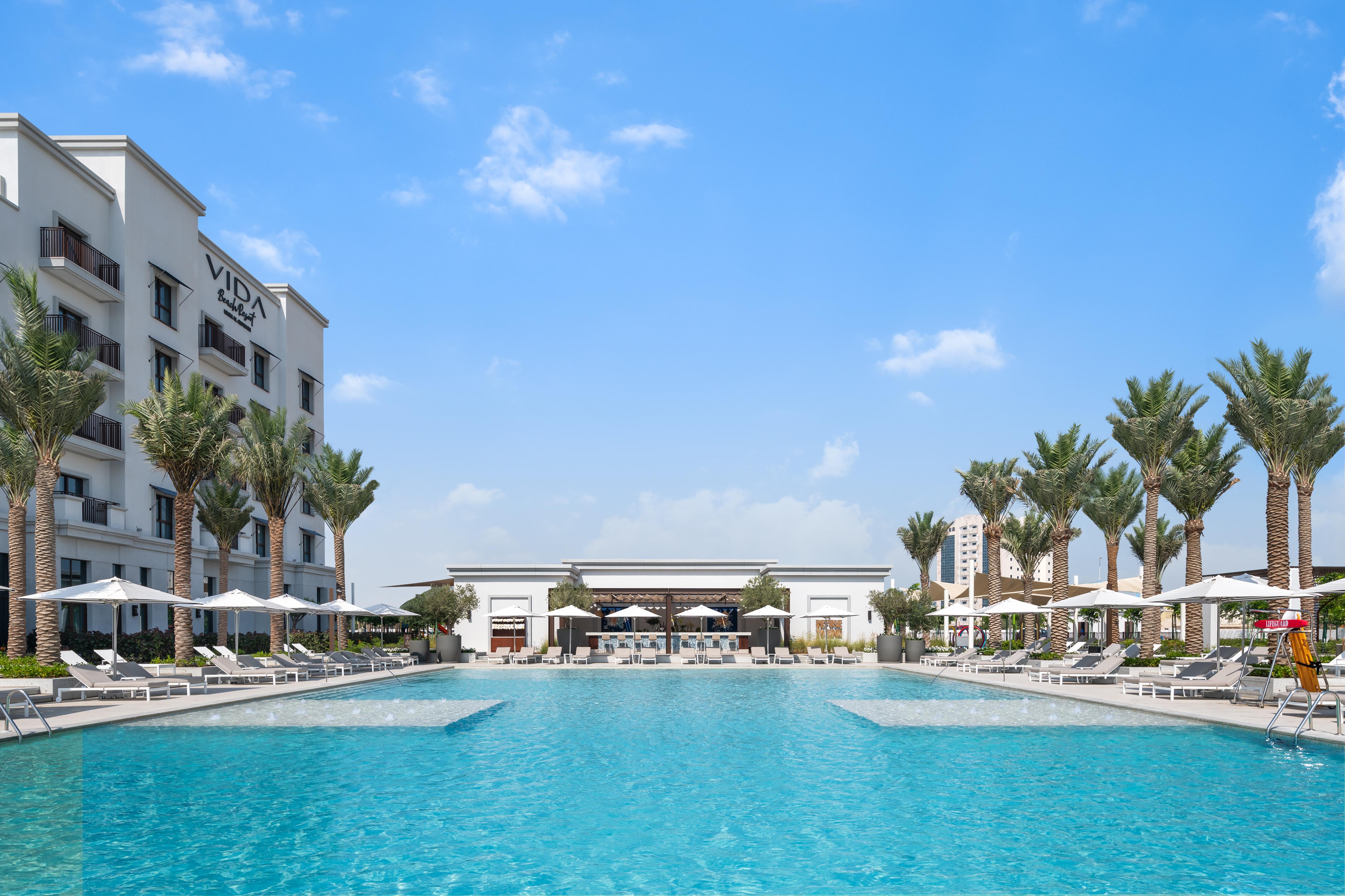 Vida Beach Resort Umm Al Quwain Eksteriør billede View of the pool at Vida Downtown Dubai